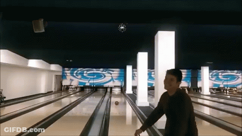 Bowling Alley With Clock On Ceiling GIF