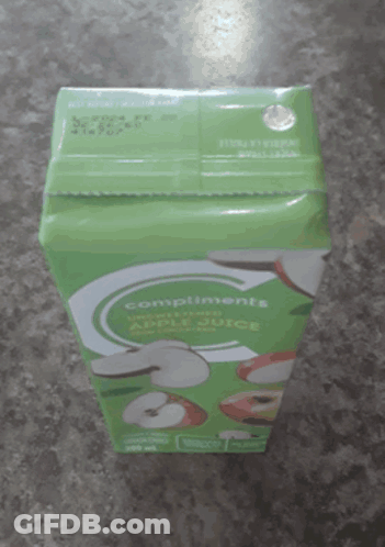 Box Of Compliments Apple Juice On Counter GIF