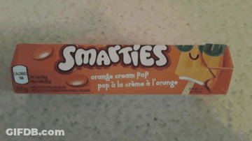 Box Of Smarties On Counter GIF