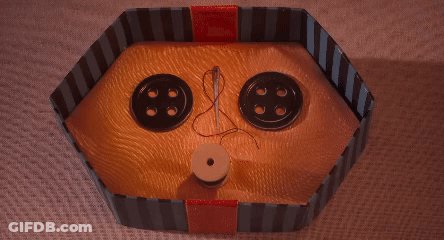 Box With Two Yellow Buttons And Needle GIF