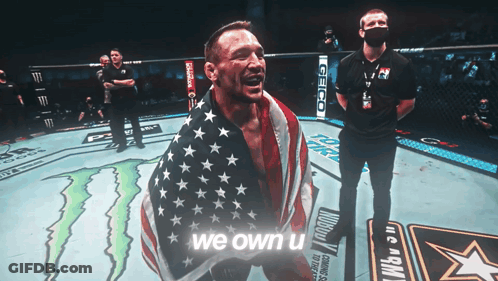 Boxer Holding American Flag Saying We Own U GIF