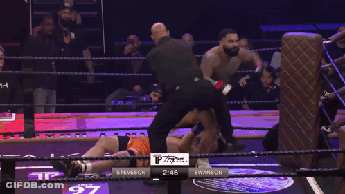 Boxer In Ring With Crowd And Texas Text GIF