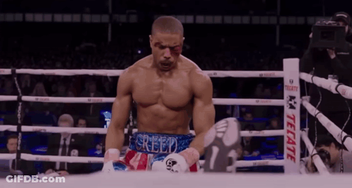 Boxer In Ring With Tecate Logo GIF
