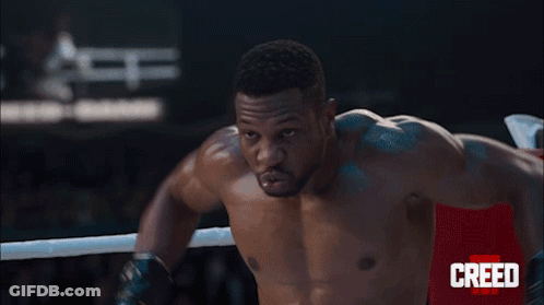 Boxers Fighting In Creed Ring GIF
