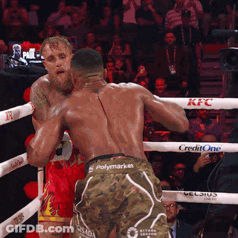 Boxers Fighting In Ring With KFC Credit One GIF