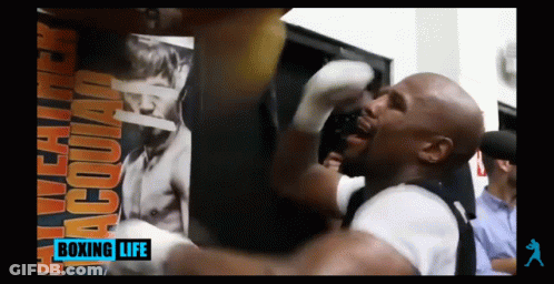 Boxing Life Ad Man Hitting Bag GIF
