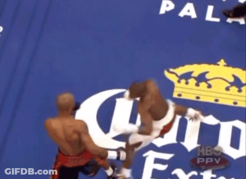 Boxing Match In Front Of Corona Advertisement GIF