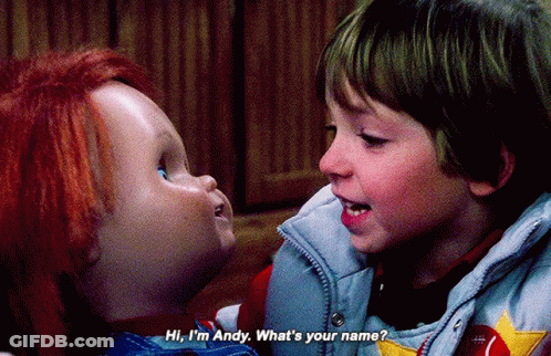 Boy And Doll Saying Hi I'm Andy GIF