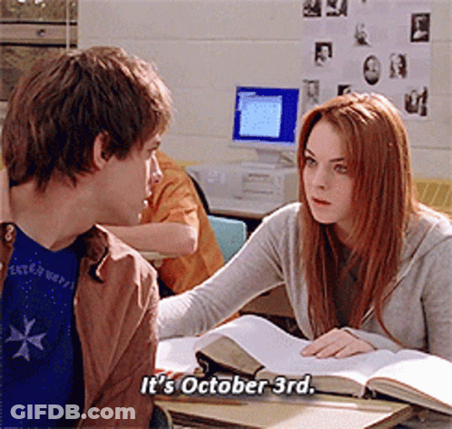 Boy And Girl At Desk Girl Says It's October 3Rd GIF