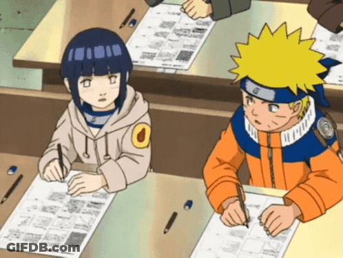 Boy And Girl At Table With Papers And Pencils GIF