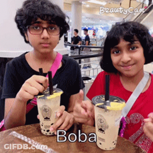 Boy And Girl Drinking Boba GIF