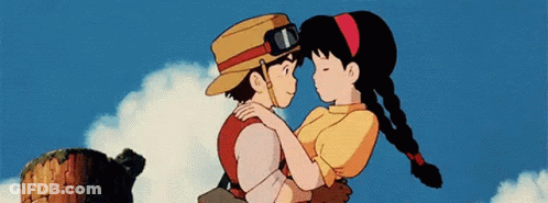 Boy And Girl Hugging And Looking At Each Other GIF