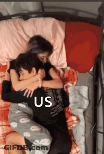 Boy And Girl Hugging On Bed GIF