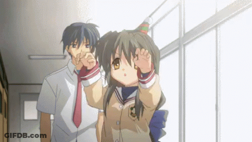 Boy And Girl In Hallway With Birthday Hat GIF