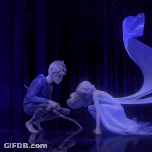 Boy And Girl Kneeling In Dark Room GIF