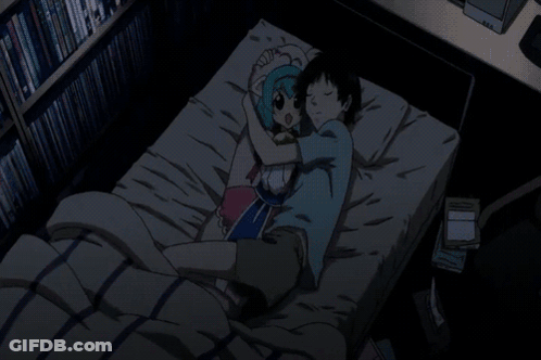Boy And Girl Laying On Bed With Bookshelf GIF