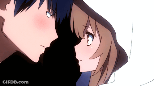 Boy And Girl Looking At Each Other In Dark Room GIF