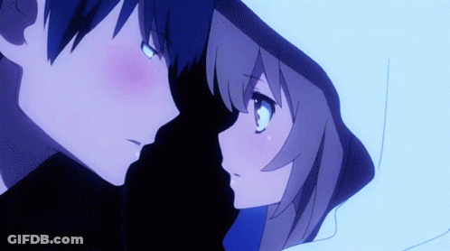 Boy And Girl Looking At Each Other In Darkness GIF