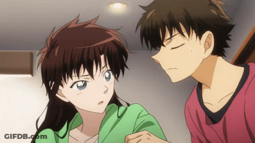 Boy And Girl Looking At Each Other In Room GIF