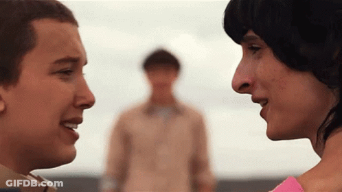 Boy And Girl Looking At Each Other GIF