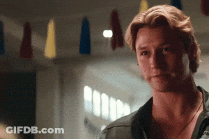 Boy And Girl Making Heart Shape In Field GIF