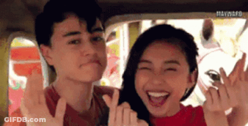 Boy And Girl Making Heart Shape GIF