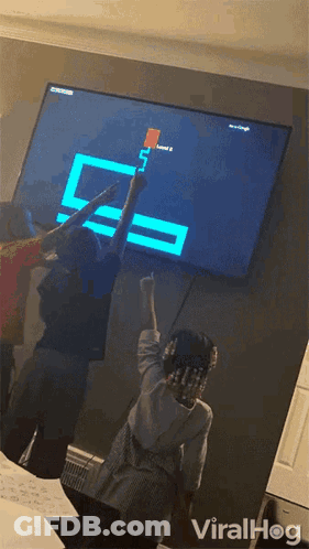 Boy And Girl Playing Video Game GIF