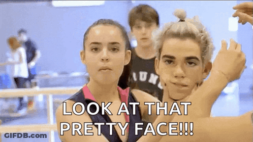 Boy And Girl Saying Look At That Pretty Face GIF