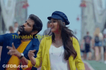 Boy And Girl Sitting In Front Of Heart GIF