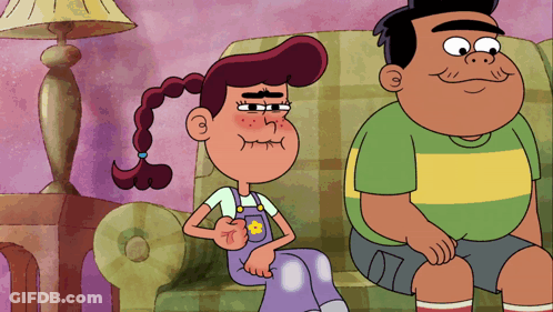 Boy And Girl Sitting On Couch GIF
