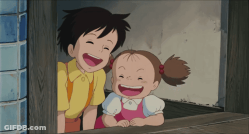 Boy And Girl Smiling From Doorway GIF