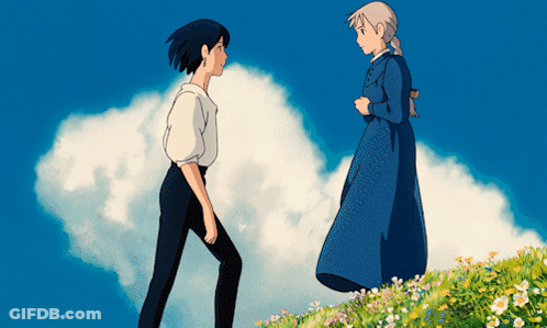 Boy And Girl Standing In Field GIF
