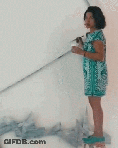 Boy And Girl Standing In Front Of Building With Zhut GIF