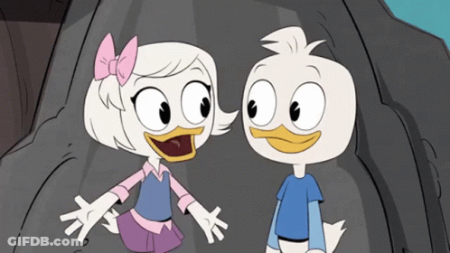 Boy And Girl Standing Next To Each Other GIF
