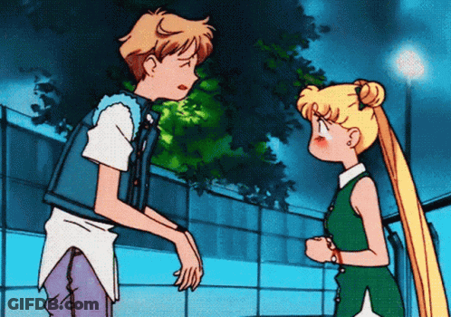 Boy And Girl Standing Next To Each Other GIF