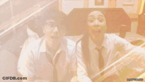 Boy And Girl Standing With Mouths Open GIF