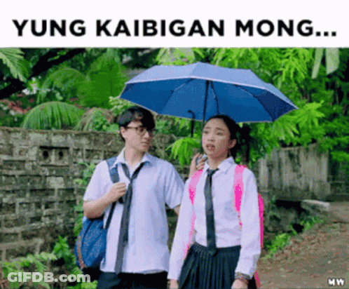 Boy And Girl Walking Under Umbrella Yung Kaibigan Mong GIF