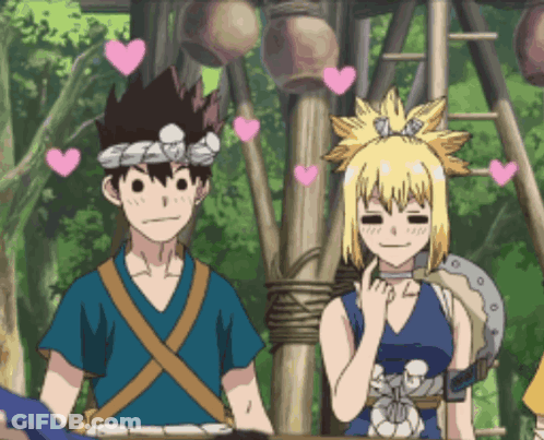 Boy And Girl With Pink Hearts Above GIF