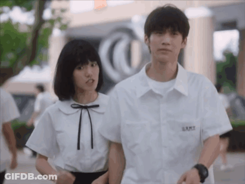 Boy And Girl With Shirt Saying LRMZ GIF