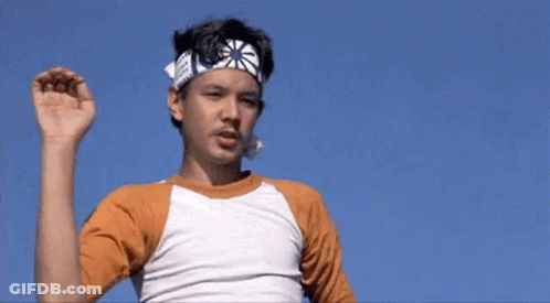 Boy And Man In Karate Uniforms Talking GIF