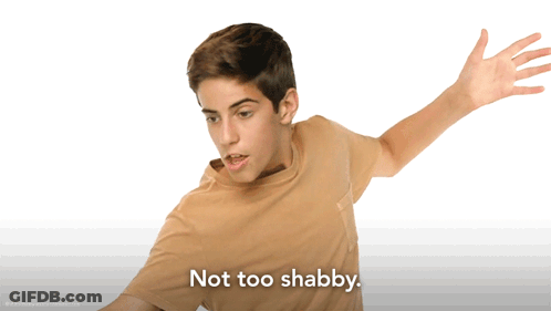 Boy Arms Outstretched Saying Not Too Shabby GIF