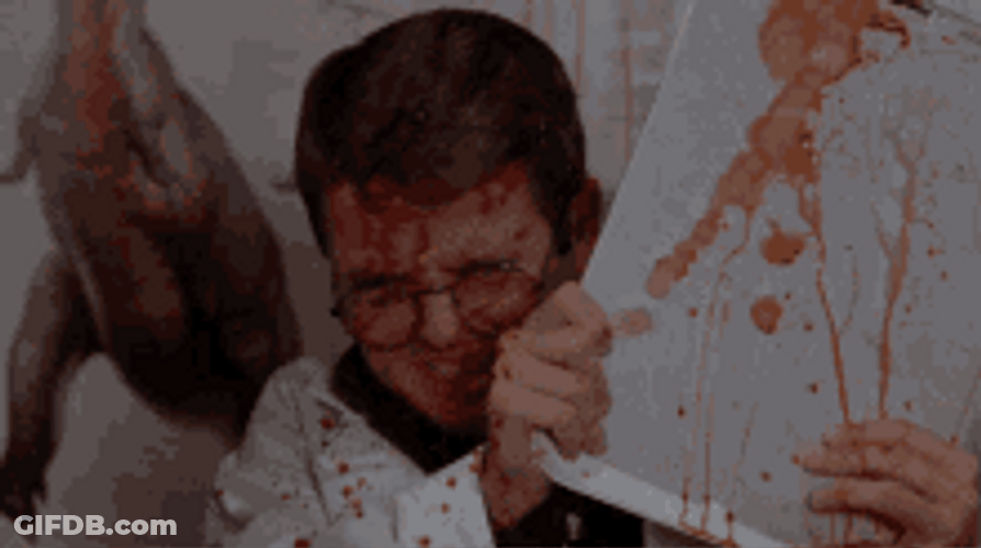 Boy Covering Himself From Blood GIF
