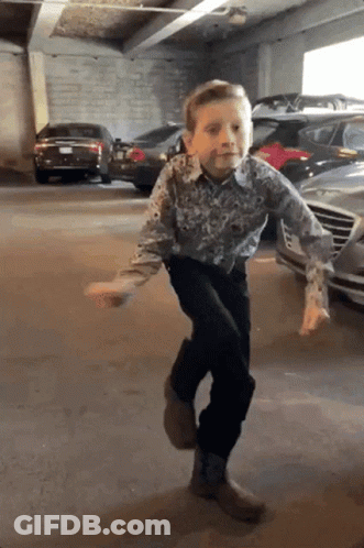Boy Dancing In Parking Garage GIF