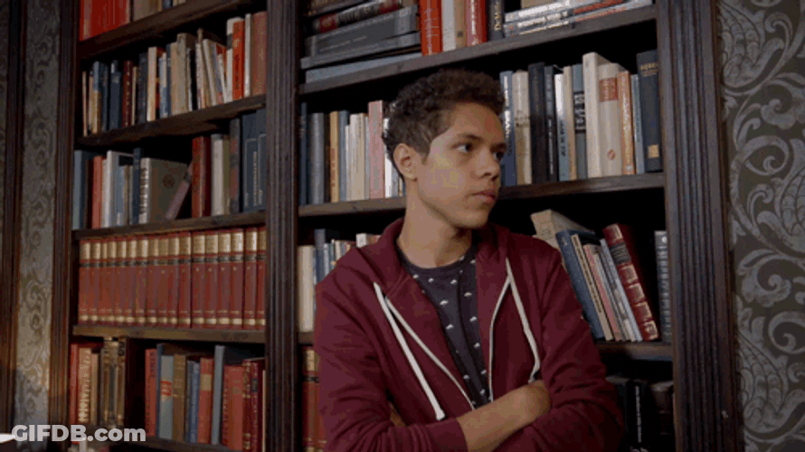 Boy Discovers Secret Door Opening GIF
