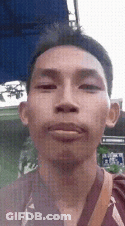 Boy Disgusting Spit To Camera GIF