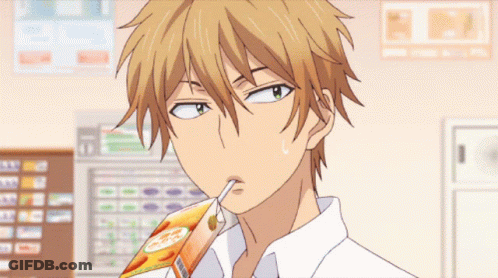 Boy Drinking From Orange Carton GIF