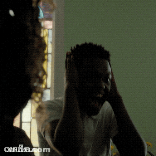 Boy Ear Plugs While Screaming GIF