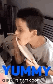 Boy Eating Spaghetti With Tongue Out GIF