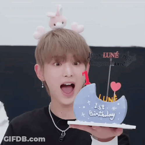 Boy Holding Cake Saying Lune GIF