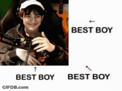 Boy Holding Camera With Best Boy Below GIF